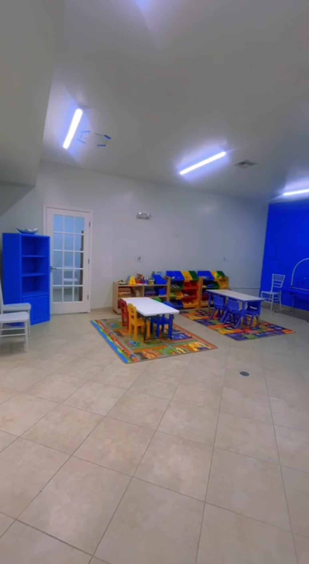 Bright pediatric therapy room at Behavioral for Kids with soft seating and learning materials